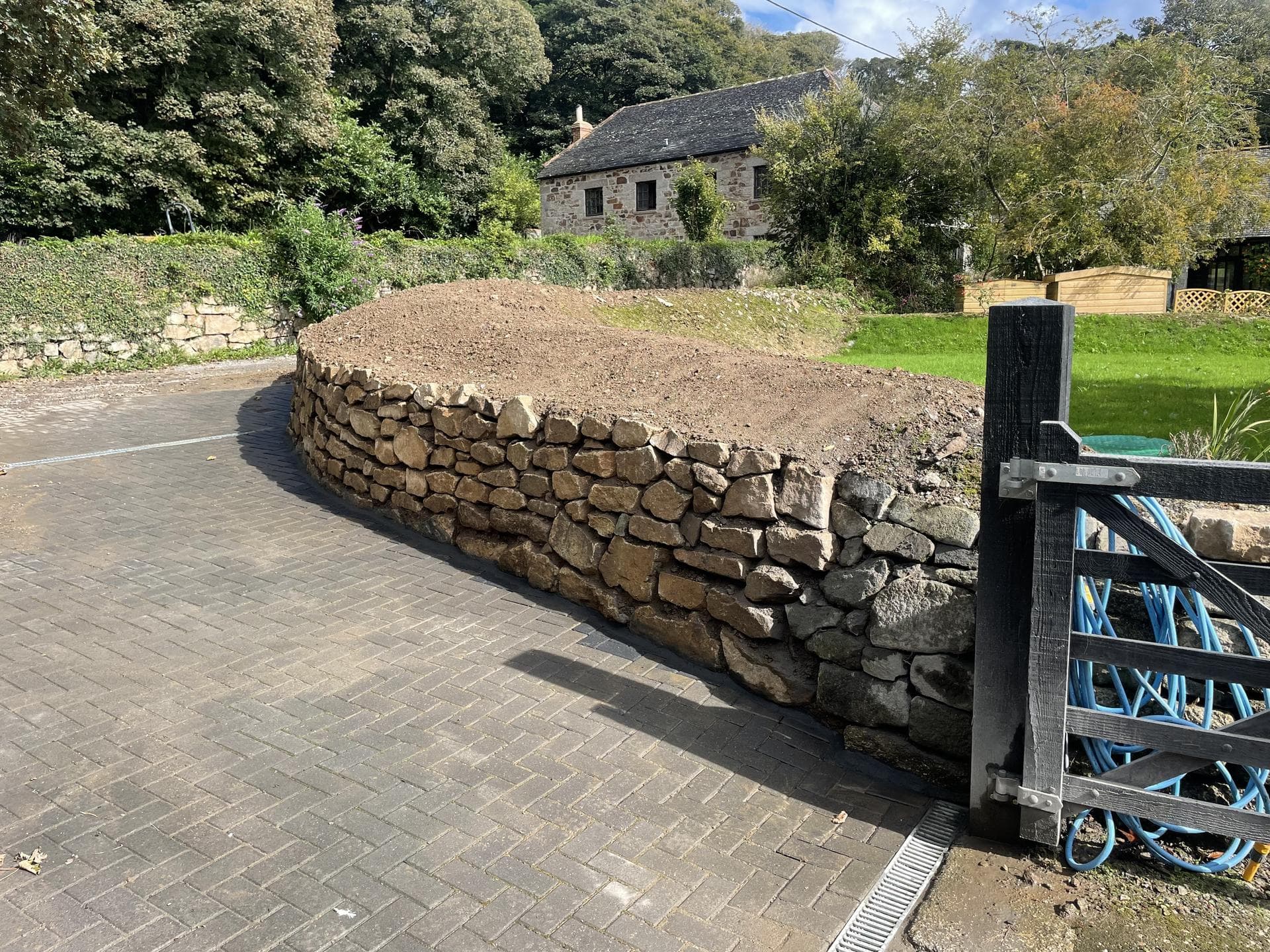 Clowance Estate driveway and stone wall